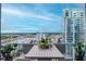 Relaxing balcony showcasing city views, with dining space and potted plants at 777 N Ashley Dr # 2513, Tampa, FL 33602
