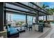 Comfortable covered outdoor balcony with seating and expansive city views at 777 N Ashley Dr # 2513, Tampa, FL 33602