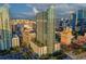 Aerial view of modern high-rise condominium building showcasing its architectural design and urban surroundings at 777 N Ashley Dr # 2513, Tampa, FL 33602