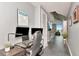 Inviting hallway with a modern workspace, stylish decor, and views of the city skyline at 777 N Ashley Dr # 2513, Tampa, FL 33602