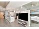 Open concept living area featuring a kitchen with bar seating and connecting bedroom at 777 N Ashley Dr # 2513, Tampa, FL 33602