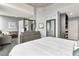 This spacious bedroom features sleek gray walls, modern furniture, and a luxurious bed, creating a serene retreat at 777 N Ashley Dr # 2513, Tampa, FL 33602