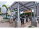 This outdoor grill area with a pergola provides an ideal spot for entertaining and enjoying the outdoors at 777 N Ashley Dr # 2513, Tampa, FL 33602