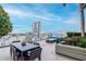 Rooftop deck with dining area and stunning city views, perfect for outdoor gatherings at 777 N Ashley Dr # 2513, Tampa, FL 33602