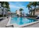 Resort-style pool featuring palm trees and city views, offering a luxurious oasis for residents to relax and enjoy at 777 N Ashley Dr # 2513, Tampa, FL 33602