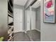 This walk-in closet features custom shelving and a full-length mirror, providing ample storage and style at 777 N Ashley Dr # 2513, Tampa, FL 33602
