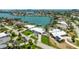 Panoramic aerial shot of waterfront community and homes with multiple docks at 7892 10Th S Ave, St Petersburg, FL 33707