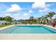 Beautiful backyard pool area overlooking a canal, offering a serene setting for relaxation and entertainment at 7892 10Th S Ave, St Petersburg, FL 33707