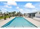 Backyard pool with a patio, gazebo, and awning at 7892 10Th S Ave, St Petersburg, FL 33707