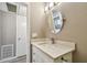 Bathroom featuring a stylish vanity with a white countertop and updated fixtures at 8080 112Th St # 108, Seminole, FL 33772