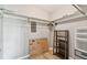 Walk-in closet featuring ample storage and organization space with wood-look floors at 8080 112Th St # 108, Seminole, FL 33772