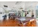 Large game room with billiard tables, library, sitting area, and lots of natural light at 8080 112Th St # 108, Seminole, FL 33772