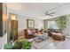 Living room featuring leather furniture and wood-look flooring at 8080 112Th St # 108, Seminole, FL 33772