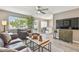 Spacious living room leads to the kitchen and features neutral tones and a large window at 8080 112Th St # 108, Seminole, FL 33772