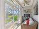 Relaxing sunroom with plenty of natural light and a view of the outside at 8080 112Th St # 108, Seminole, FL 33772
