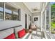 Inviting sunroom with comfortable seating, natural light, and views of the backyard at 8080 112Th St # 108, Seminole, FL 33772