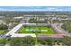 Scenic aerial view of the community featuring a lush green space and a refreshing pool at 8100 Dr Martin Luther King Jr N St # 202, St Petersburg, FL 33702