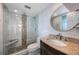 Modern bathroom with glass shower, granite countertop, and updated fixtures at 8100 Dr Martin Luther King Jr N St # 202, St Petersburg, FL 33702