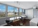Bright sunroom featuring large windows with shutters at 8100 Dr Martin Luther King Jr N St # 202, St Petersburg, FL 33702