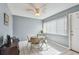 Inviting dining area with ceiling fan and natural light at 8447 Orleans N, Pinellas Park, FL 33781