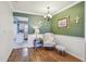 Cozy dining area with a comfortable chair and decorative wall art at 8447 Orleans N, Pinellas Park, FL 33781