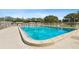 Community swimming pool with lounge chairs and the depth listed as three feet at 8447 Orleans N, Pinellas Park, FL 33781