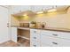 Spacious laundry room with white cabinets, granite countertop, and room for decorations at 8515 Macoma Ne Dr, St Petersburg, FL 33702