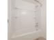 Clean and basic bathroom with a white tub/shower combo and vinyl surround at 8701 Driftwood Drive Dr, Tampa, FL 33615