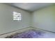 Bright, unfinished bedroom with a window offering outside views and awaiting personalization at 8701 Driftwood Drive Dr, Tampa, FL 33615