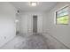 Bedroom showcasing an open closet and bright, airy space with great natural light at 8701 Driftwood Drive Dr, Tampa, FL 33615