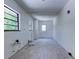 Spacious laundry room with plenty of natural light and a convenient door to the outside at 8701 Driftwood Drive Dr, Tampa, FL 33615