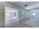 Renovated living room with new flooring and natural light at 8701 Driftwood Drive Dr, Tampa, FL 33615