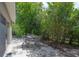 Outdoor patio area with dining table and seating, perfect for entertaining at 8701 Driftwood Drive Dr, Tampa, FL 33615