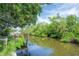 Scenic waterway with a private dock, offering a tranquil and nature-filled setting at 8701 Driftwood Drive Dr, Tampa, FL 33615