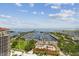Aerial view of the marina with a view of the bay with blue skies and high rise buildings at 100 1St N Ave # 2304, St Petersburg, FL 33701