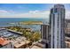 Stunning aerial view featuring marina, ocean, and the modern high-rise condo building at 100 1St N Ave # 2304, St Petersburg, FL 33701