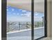 Wide balcony featuring amazing marina views framed by floor to ceiling sliding glass door at 100 1St N Ave # 2304, St Petersburg, FL 33701