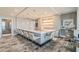 Stylish bar area featuring ample seating, elegant lighting, and a sophisticated atmosphere at 100 1St N Ave # 2304, St Petersburg, FL 33701
