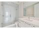 Clean, tiled bathroom featuring large glass shower enclosure and modern vanity with sink at 100 1St N Ave # 2304, St Petersburg, FL 33701