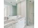 Elegant bathroom with double sinks, stylish fixtures, and a separate water closet for added privacy at 100 1St N Ave # 2304, St Petersburg, FL 33701