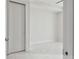 Clean bedroom design boasting tile flooring, ample space, and a nearby closet at 100 1St N Ave # 2304, St Petersburg, FL 33701