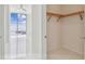 View of the bedroom with tile floors and beautiful views and the open closet at 100 1St N Ave # 2304, St Petersburg, FL 33701