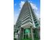 Modern high-rise apartment building with glass balconies and 100 First Avenue South address at 100 1St N Ave # 2304, St Petersburg, FL 33701