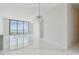 Spacious living area with floor-to-ceiling windows offering breathtaking waterfront views at 100 1St N Ave # 2304, St Petersburg, FL 33701