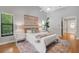 Spacious bedroom featuring a large window, hard wood flooring and a calming interior at 1000 Chatham Ct, Safety Harbor, FL 34695