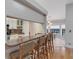 Breakfast nook with pool views and modern lighting at 1000 Chatham Ct, Safety Harbor, FL 34695
