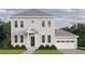 Charming two-story home with a well-manicured lawn, attached garage, and a welcoming entrance at 1008 Montrose N Blvd, St Petersburg, FL 33703