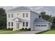 Charming two-story home with a well-manicured lawn, attached garage, and a welcoming entrance at 1008 Montrose N Blvd, St Petersburg, FL 33703