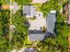 Aerial view showing parking and a neighborhood of houses and trees at 1011 S Moody Ave # 11, Tampa, FL 33629