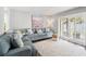 Bright and open living room with stylish decor and lots of natural light at 1011 S Moody Ave # 11, Tampa, FL 33629